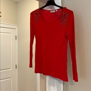 Red. Shoulder jewels.